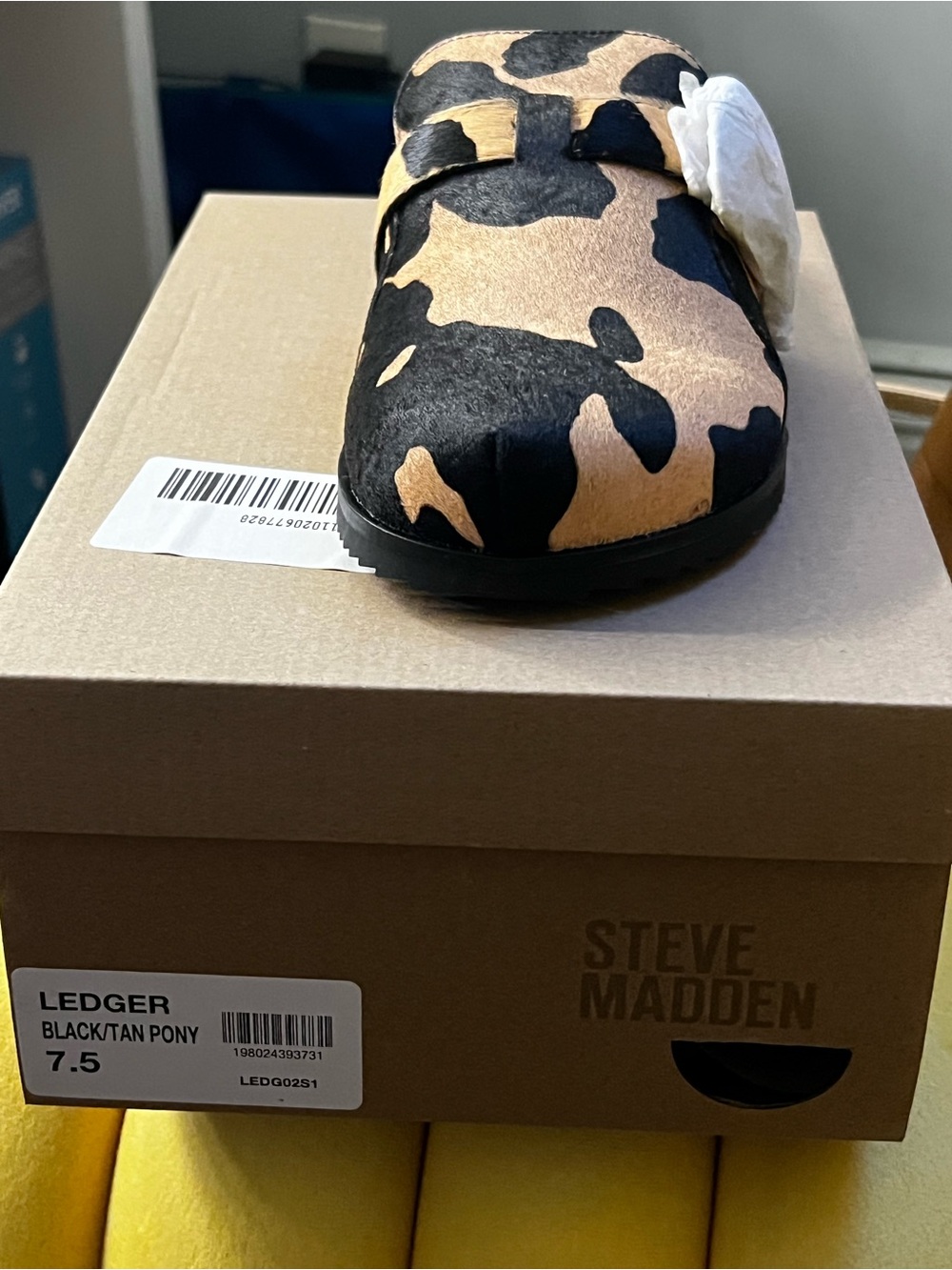 Steve Madden Women's Ledger Slip-On Clog in Black and Tan Pony Cow Print